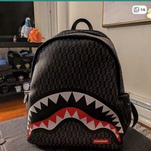 Sprayground Black and Red Shark Backpack